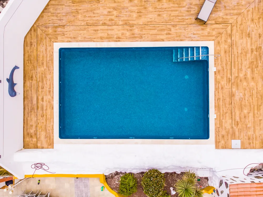Aerial view of a holiday rental pool maintained by Tenerife Pools